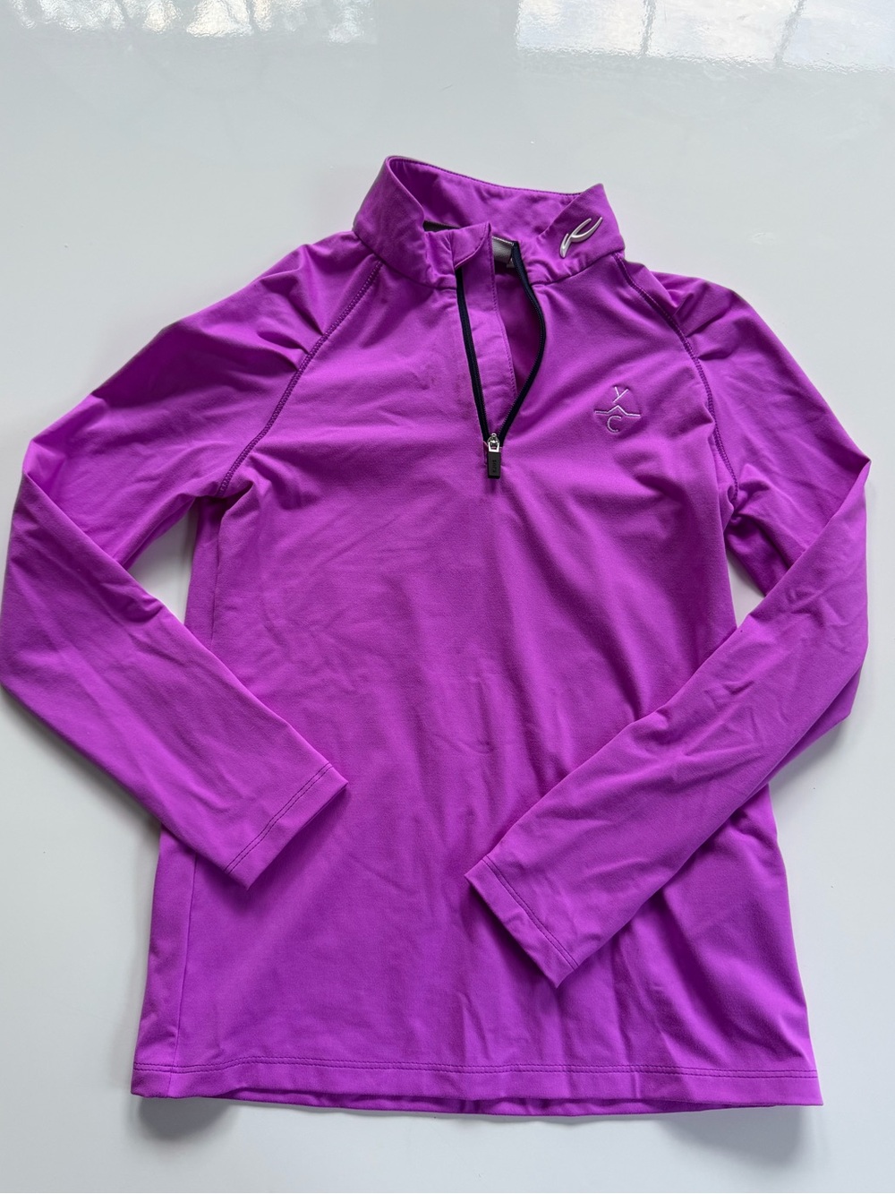 KJUS girls purple mid layer ski top (size S / 128)